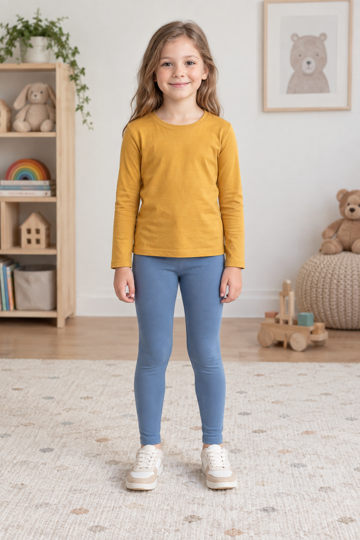 Front view of dusty-blue children's ankle-length leggings styled with an ochre long-sleeve top. Generated design preview.