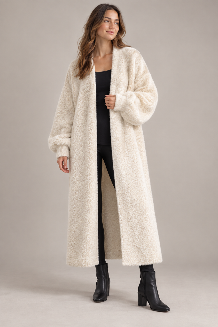 AI design concept: cream long open-front blanket cardigan with dropped shoulders and cuffed sleeves.