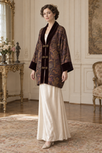 Three-quarter view of the SL004 evening coat design, showing the shawl collar, loose integral sleeves and contrast cuffs.
