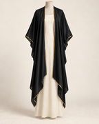 AI concept illustration of 1919 draped evening wrap, front view in alternative black, on a mannequin.