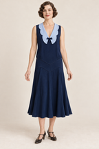 AI design concept: sleeveless navy chevron-yoke dress with powder-blue scalloped collar, front.