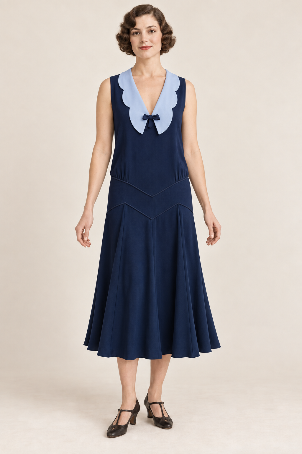 AI design concept: sleeveless navy chevron-yoke dress with powder-blue scalloped collar, front.