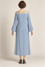 AI design concept: long-sleeve powder-blue hip-tie dress showing the shoulder yoke and straight back.