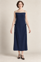 AI design concept: sleeveless navy view of the same hip-tie dress with champagne yoke, front.