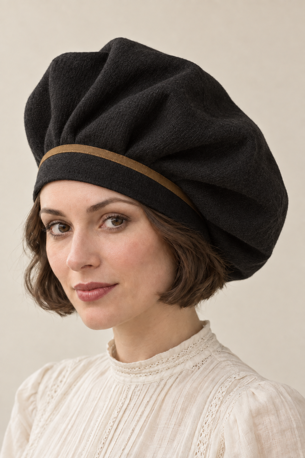AI design illustration of the black tam arranged with raised soft folds above the forehead, an alternate styling of the same crown