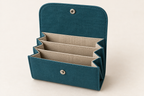 AI design preview: open petrol teal accordion snap wallet with flax lining, two divider walls and three expanding compartments