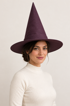 AI design preview: same adult woman and aubergine pointed witch hat in three-quarter view, with the full brim and tip visible