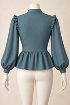 AI design preview: rear of the same teal blouse with covered darted back, standing collar, shoulder ruffles and gathered peplum