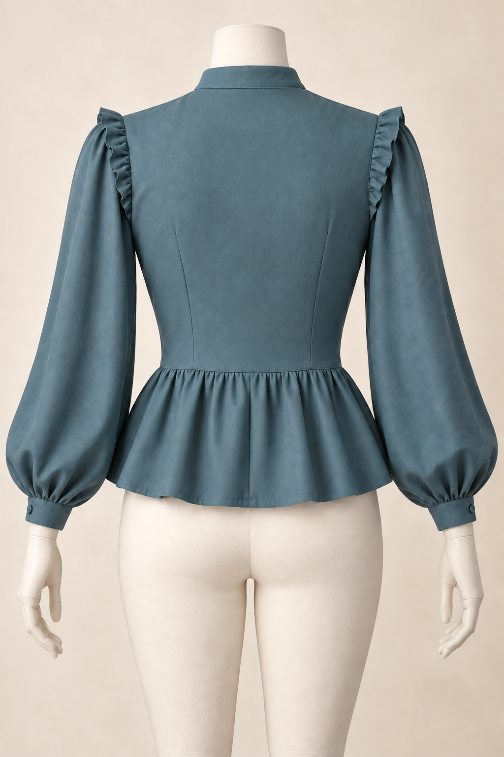 AI design preview: rear of the same teal blouse with covered darted back, standing collar, shoulder ruffles and gathered peplum