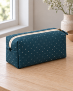 AI design preview: opposite side of the teal dotted boxed zipper pouch showing the short end, fabric tab and boxed base.
