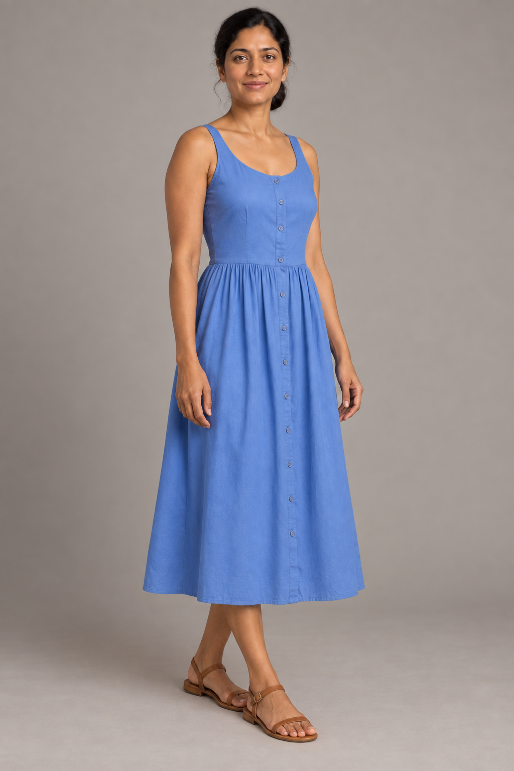 Three-quarter design preview of the cotton sundress with a dart-shaped bodice and full-length front button placket.