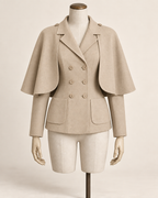 AI concept illustration of 1930s detachable cape jacket, front view in alternative sand beige, on a mannequin.