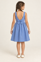 AI design preview: rear of the same blue children’s dress showing a low U back, short waist bow and level rear skirt join