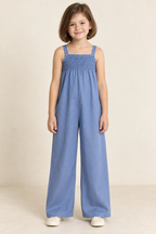 AI design preview: child in cornflower-blue jumpsuit with narrow shirred upper chest, fixed straps and loose wide full-length legs, front view