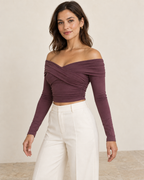 AI design preview: three-quarter view of the plum knit crop top showing the crossed front and gathered side seam