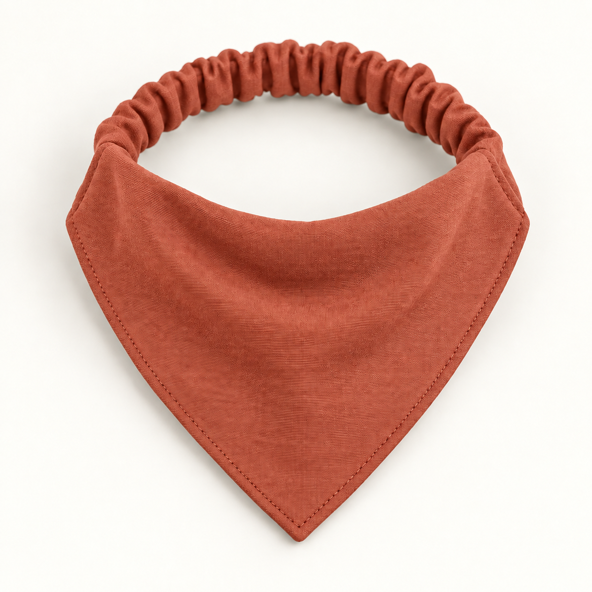 AI design preview: terracotta dog bandana with the same triangular bib and gathered elastic back band