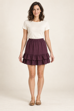 Front design preview of a dark plum double flounce mini skirt on an adult woman, with an elastic waist and two overlapping gathered ruffles