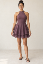 AI design preview: adult woman in a plum halter dress with princess-seam front and two circular skirt layers at a smooth waist