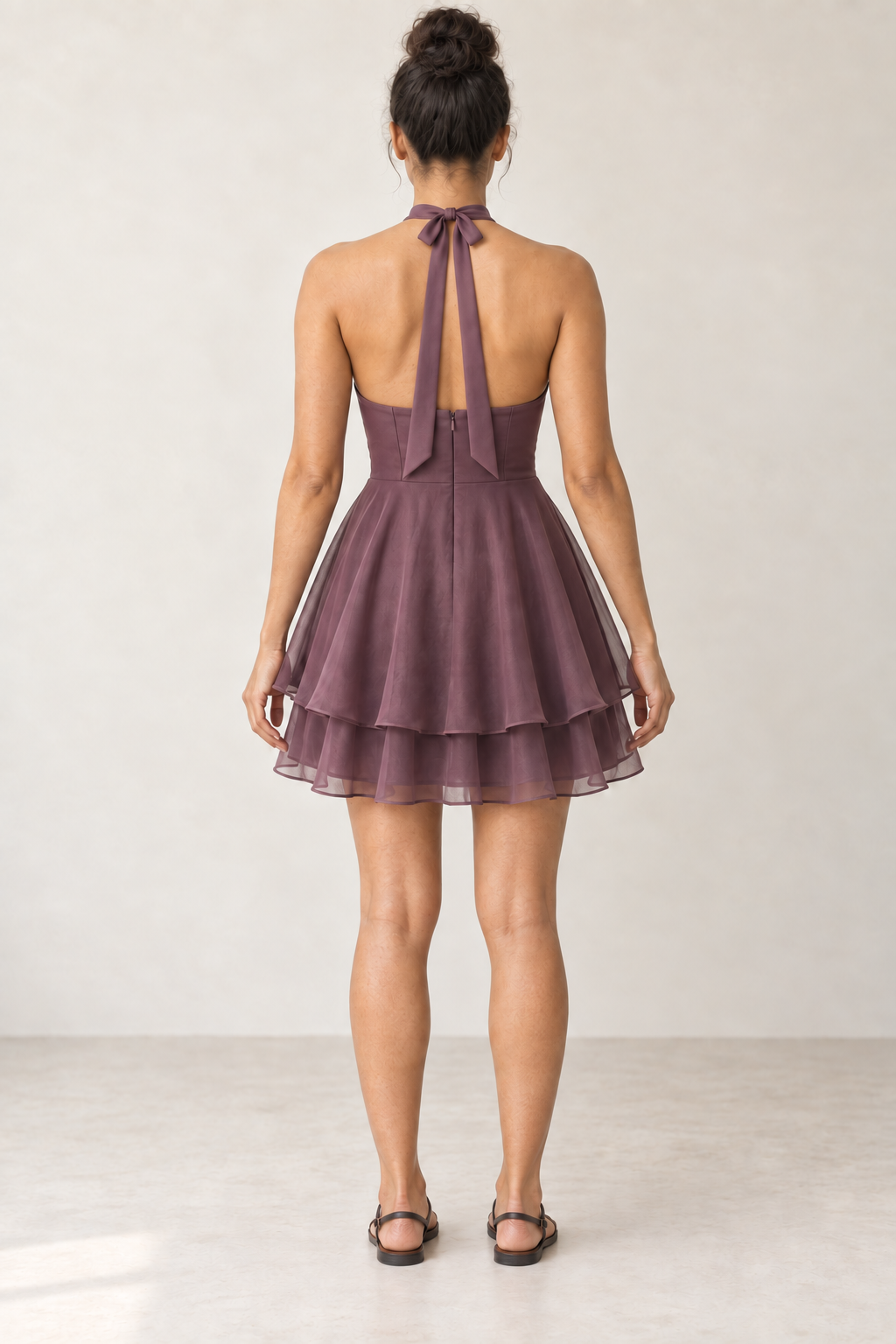 AI design preview: rear of the same plum layered halter dress, with open upper back, neck bow tails and concealed back zipper