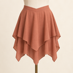 AI design preview: copper-rose handkerchief skirt front with two independent pointed layers and dipped waistband