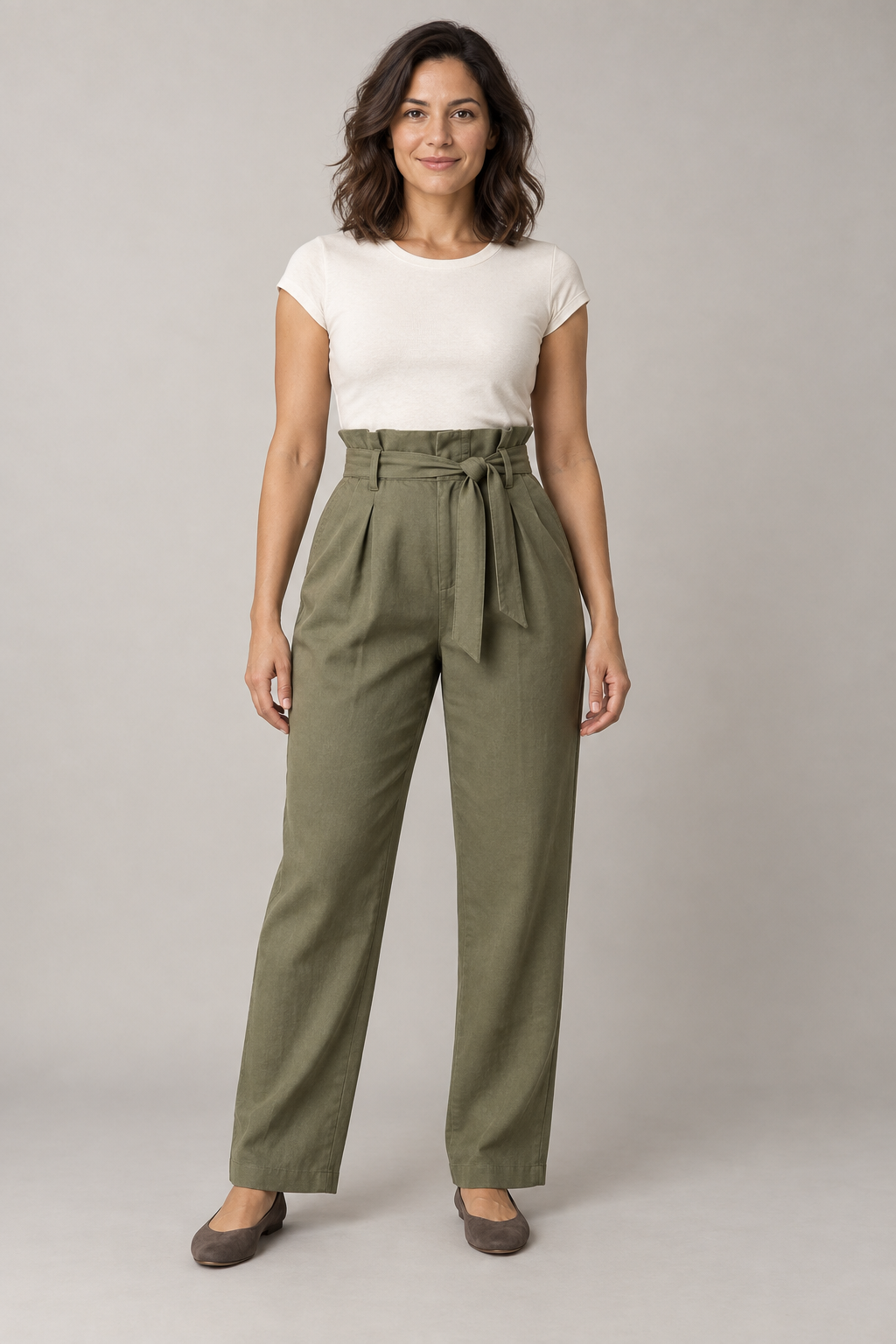 AI design preview: woman wearing olive paperbag-waist pants with front pleats, sash, fly and slanted pockets