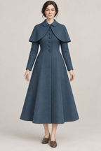 AI design preview: petrol blue princess coat with rounded collar, six front buttons and a separate short shoulder cape