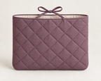 AI design preview: dusty-plum book sleeve showing the same diamond quilting and bow-tie opening