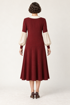 AI design concept: ruby day dress showing low-hip join and smooth flared skirt, back.