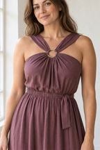 Close design preview of one ring joining the gathered front and shoulder extensions of the muted mulberry maxi dress.