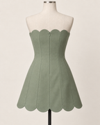 AI preview: sage scalloped mini rear with a smooth regular back and concealed center-back zipper.