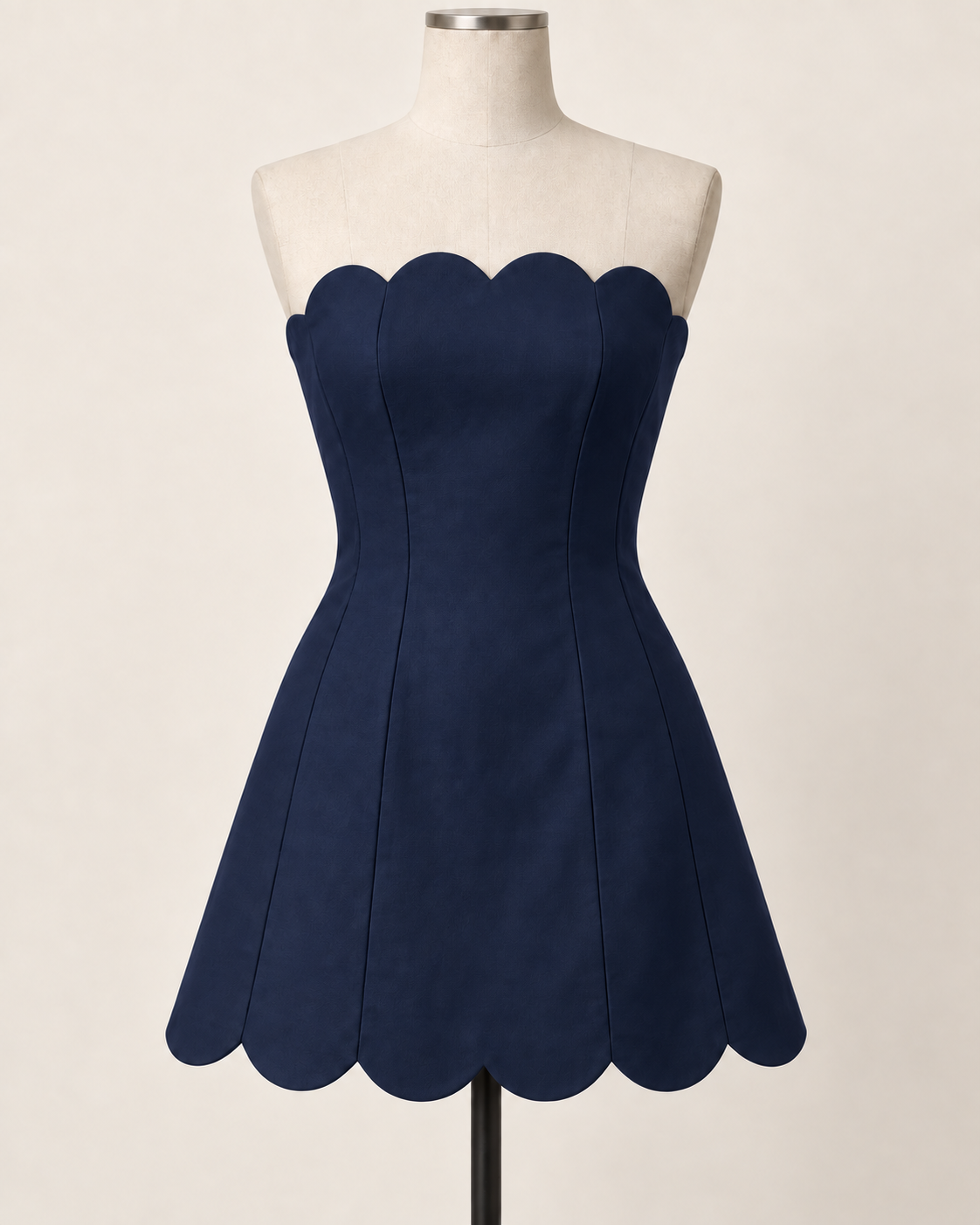 AI preview: midnight-navy color option of the same strapless scalloped mini dress.