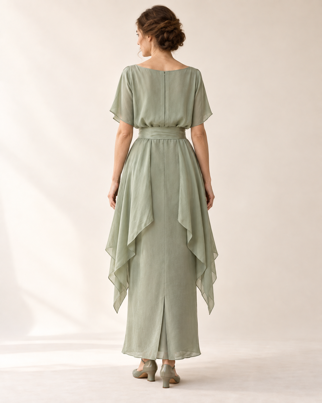 AI design illustration of the celadon draped-hip dress from the back, with a plain bodice and long side drapes