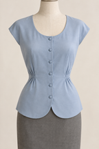 AI design preview: powder-blue button blouse with a lower round neckline, cut-on cap sleeves and gathered side waist.