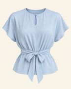 AI front preview of View A: powder-blue short kimono-sleeve blouse with a bound keyhole and front waist bow