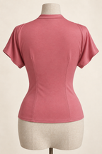 AI back preview of the rose pull-on blouse with a narrow raised neck band, short grown-on sleeves and waist shaping
