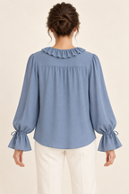 AI design preview: blue blouse back showing neckline ruffle, gathered yoke and tied wrist channels