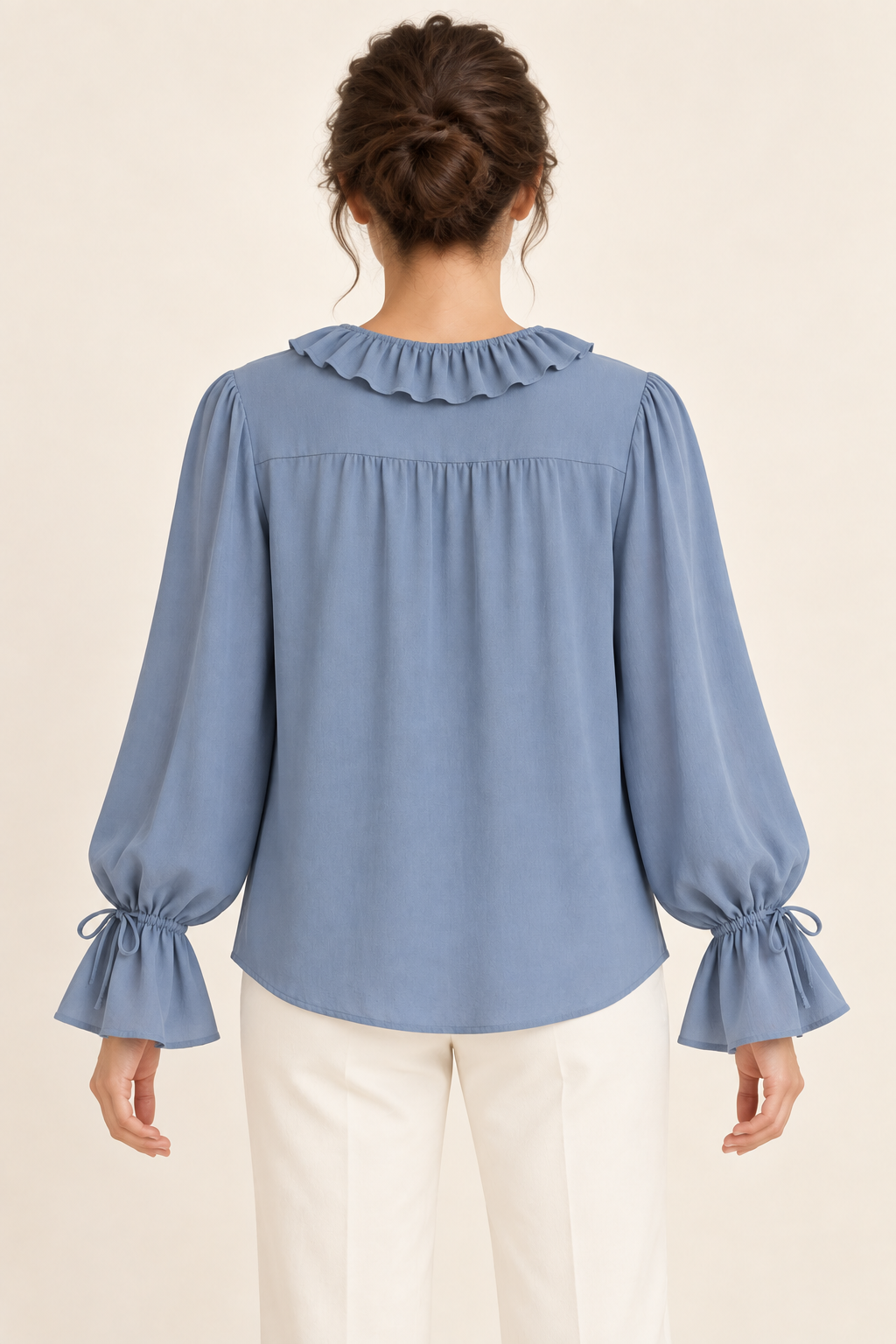 AI design preview: blue blouse back showing neckline ruffle, gathered yoke and tied wrist channels