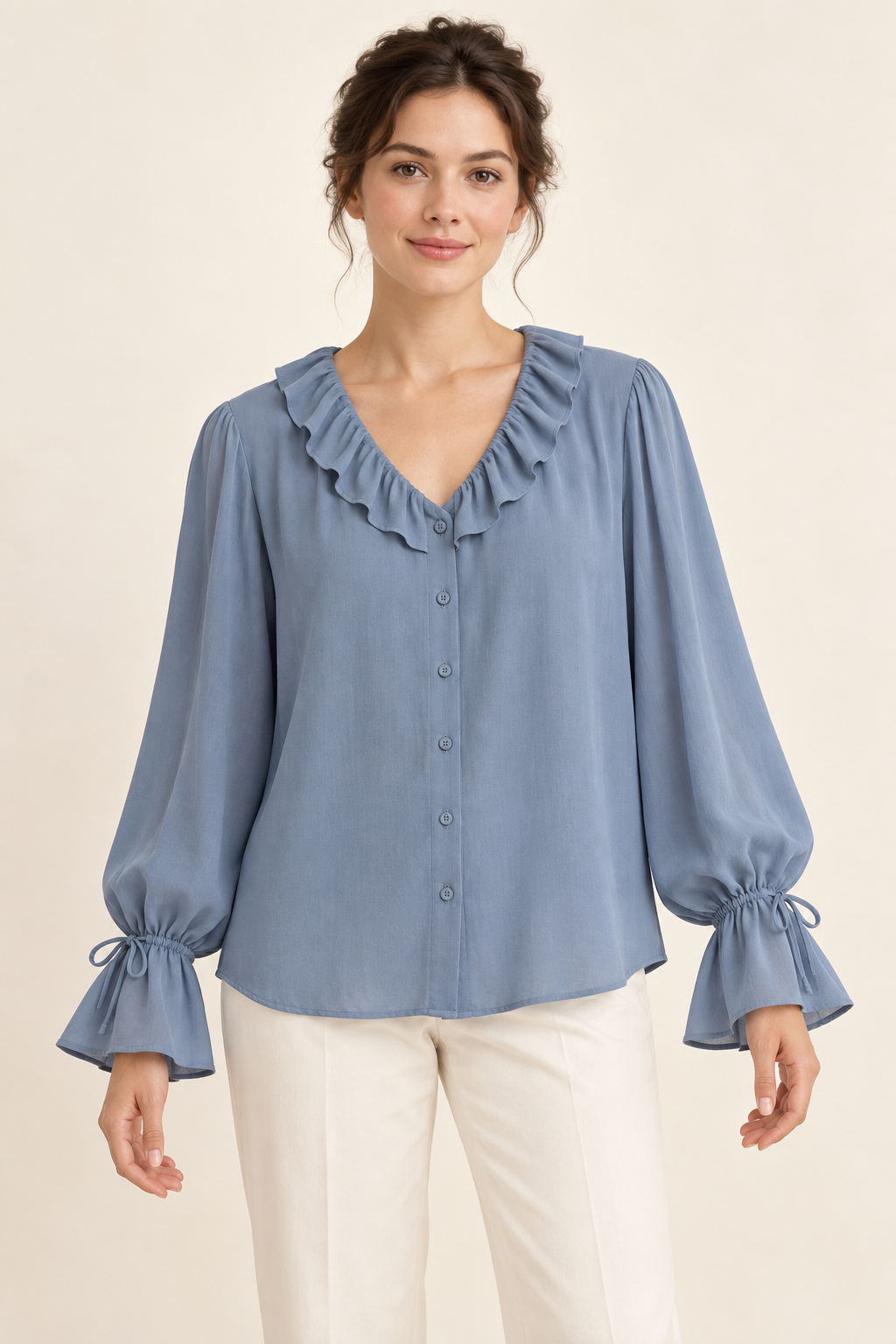 AI design preview: dusty-blue ruffle-neck button blouse with full sleeves gathered by wrist ties above flared cuffs