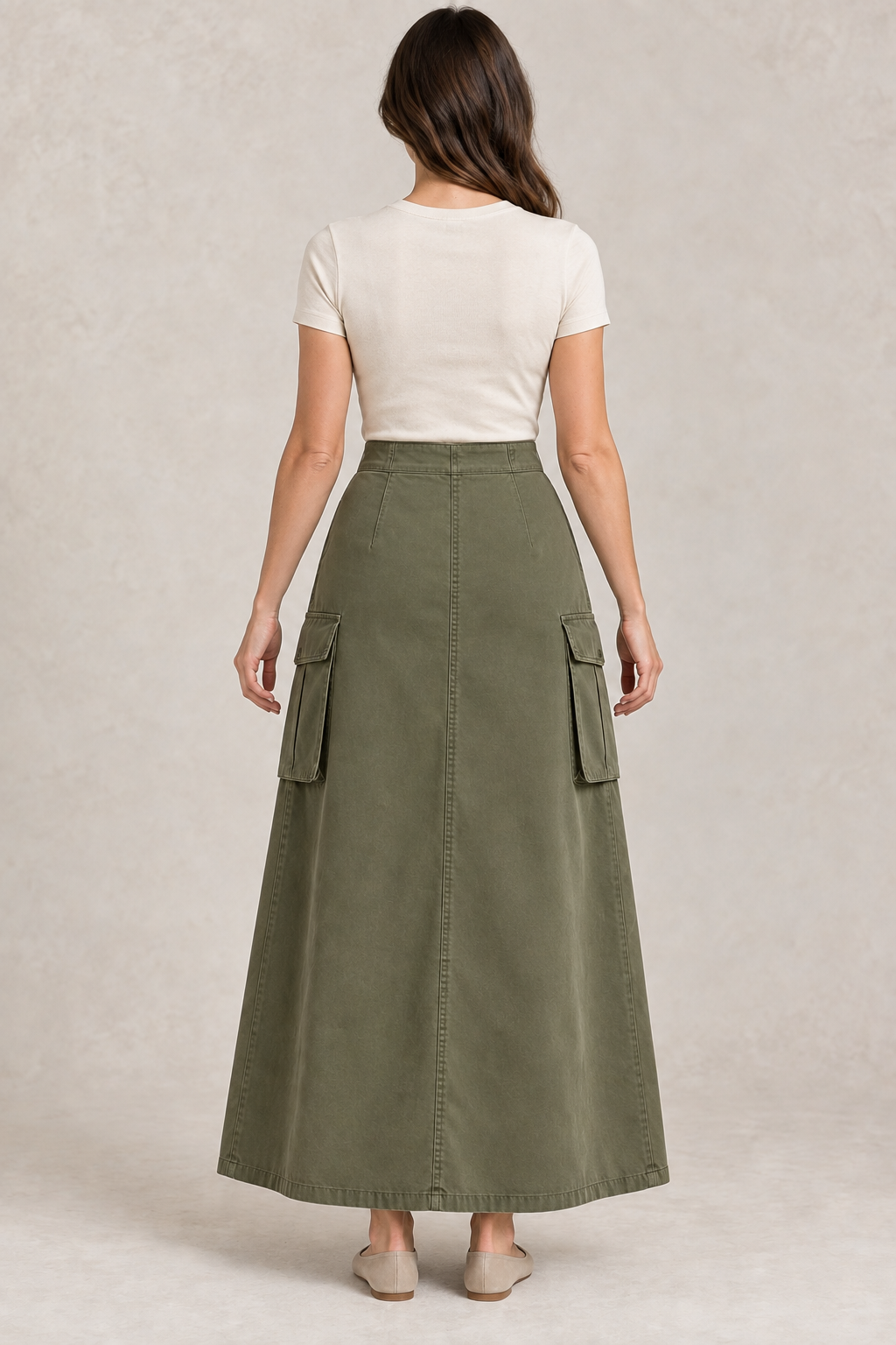 AI preview: plain back of the olive cargo maxi skirt with waist darts, side cargo pockets and a closed hem without a slit.