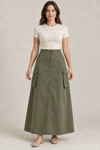 AI preview: olive A-line cargo maxi skirt with a fitted fly waist, slanted hip pockets and flapped bellows side pockets.