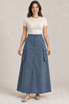 AI preview: slate-blue color option of the same closed-hem cargo maxi skirt with a front fly and bellows side pockets.