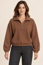 AI preview: cinnamon-brown color of the same collared half-zip knit pullover.