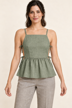 AI design preview: muted sage version of the same darted side-tie camisole with a gathered peplum