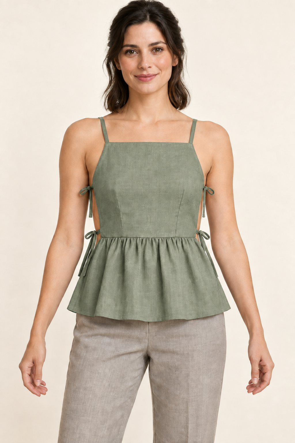 AI design preview: muted sage version of the same darted side-tie camisole with a gathered peplum