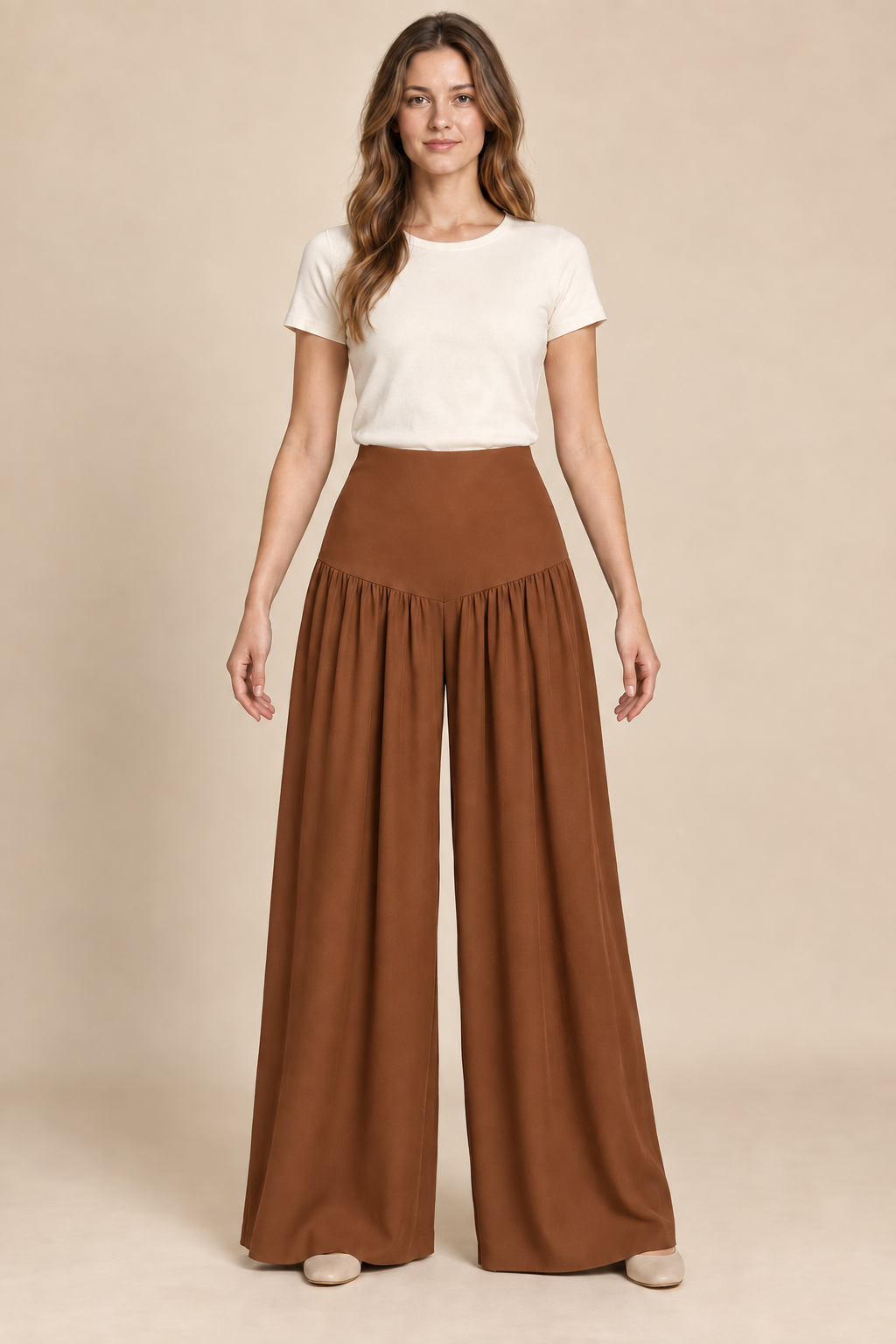 AI preview: copper option of the same fitted hip-yoke palazzo pants with gathered lower legs and plain full-length hems.
