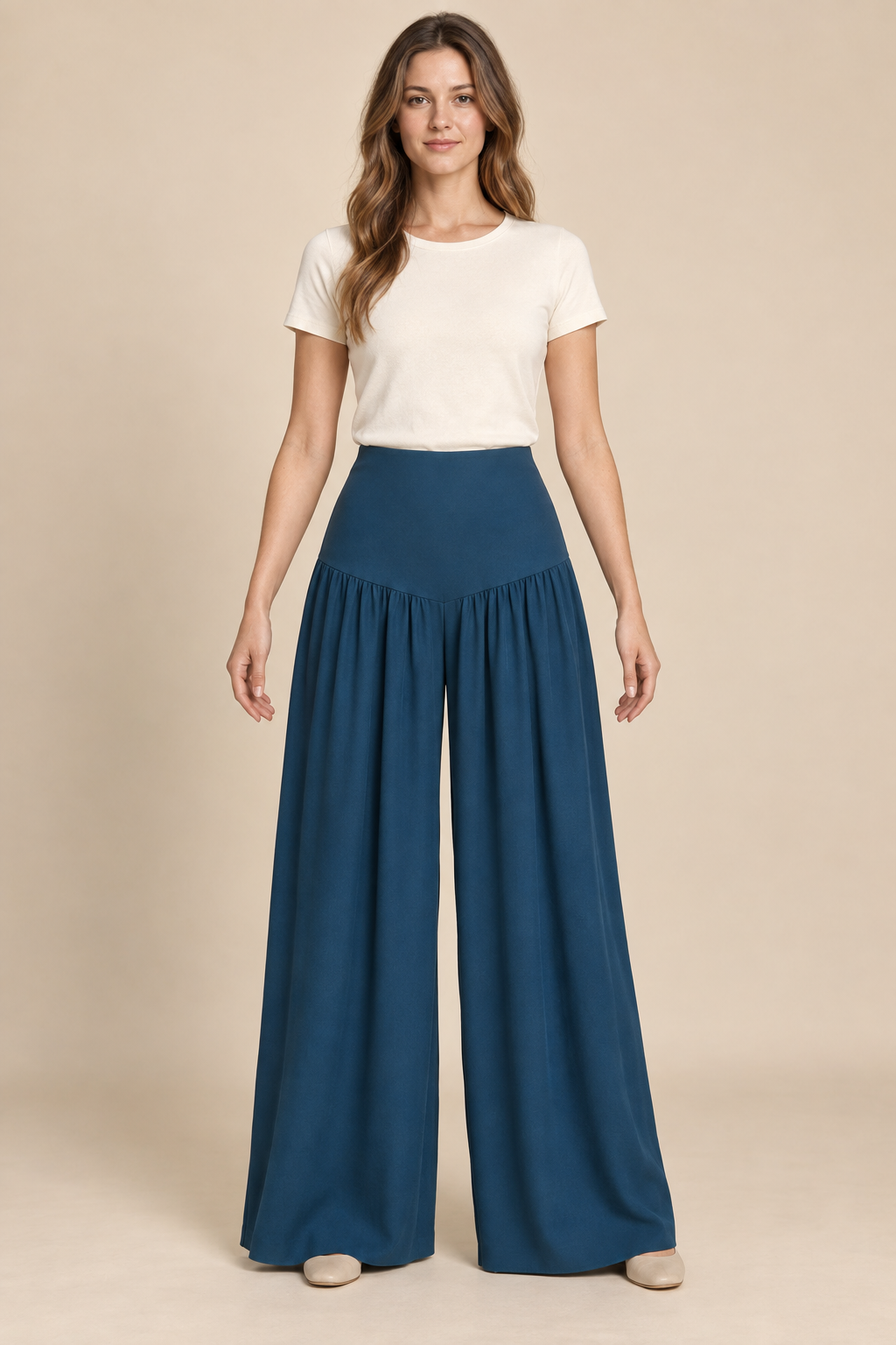 AI preview: petrol palazzo pants with a broad smooth fitted hip yoke and wide legs gathered into its lower edge.