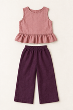AI preview: the same children's ruffle top and wide-leg pants in dusty rose and deep plum, front view.