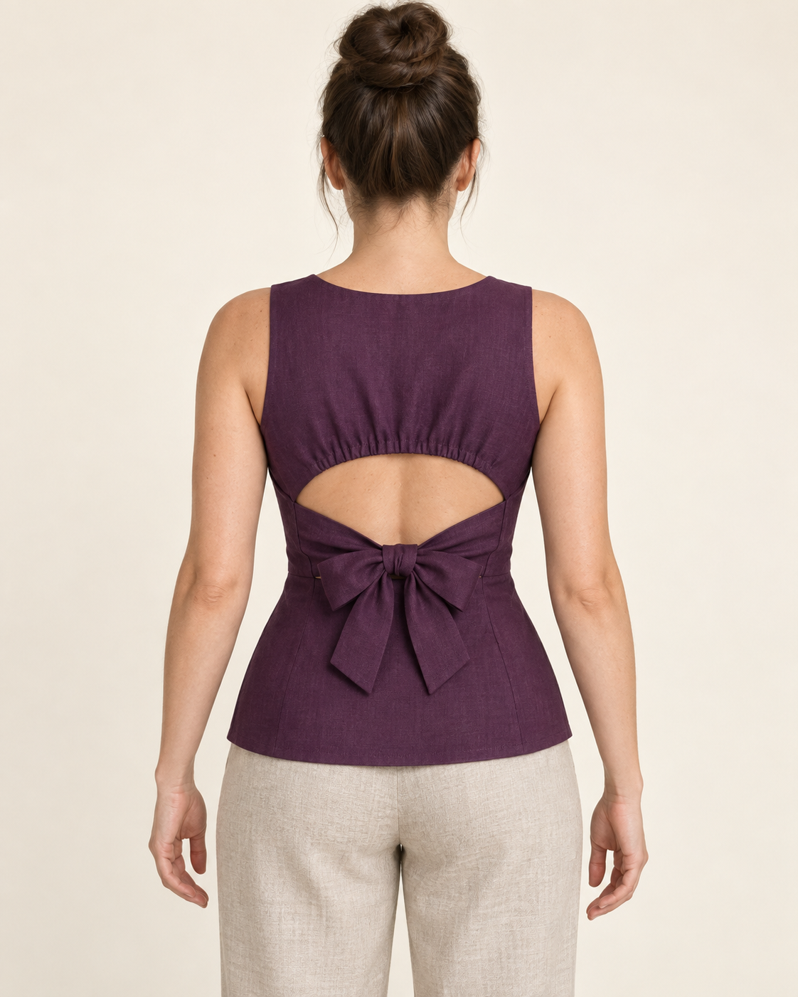 AI design preview: aubergine top back with high round neckline, gathered upper-panel edge, mid-back cutout and broad waist bow