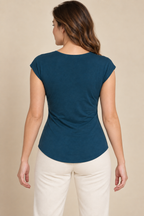 AI preview: rear of the same petrol jersey top with a high round neckline, cap shoulders and a smooth closed back.