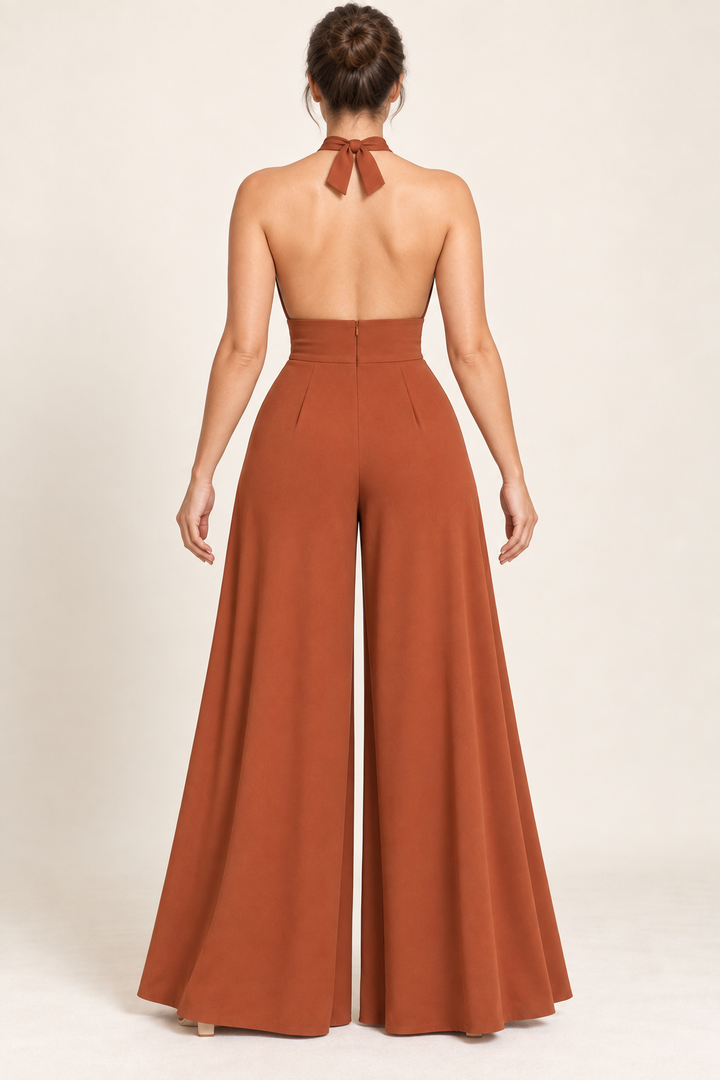 AI design preview: open back of the sienna cross-halter jumpsuit with short neck ties, concealed center-back zipper and wide legs